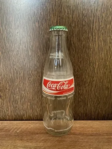 Garrafa coca cola antiga de 200ml caçulinha