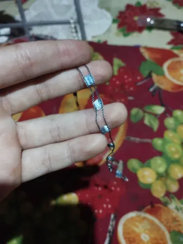 Vendo pulseira de tecido azul e preto 