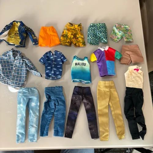 Lote de roupas para boneco ken Barbie