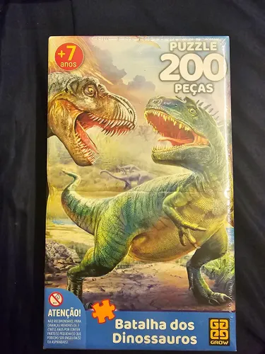 Quebra-cabeça 200 pecas. Lacrado. Batalha dos dinossauros.