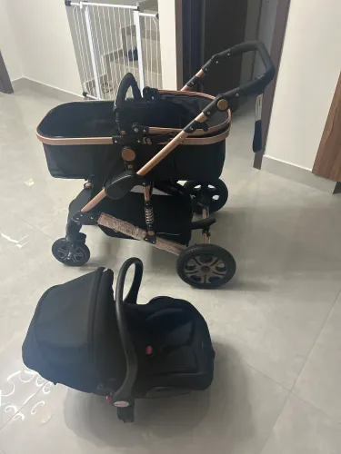 Carrinho de bebê + bebê conforto Tulibaby