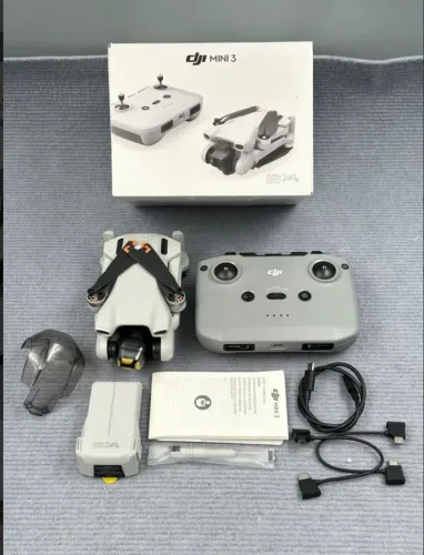 Drone Dji mini 3. Inclui Duas bateria e um cartão de memória 128gb que filma em 4k 60fps