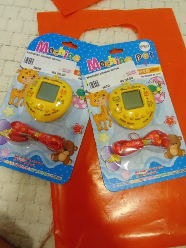 Tamagochi amarelos novos