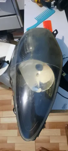 Farol original fiat punto