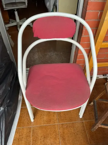 Cadeira de ferro com estofado