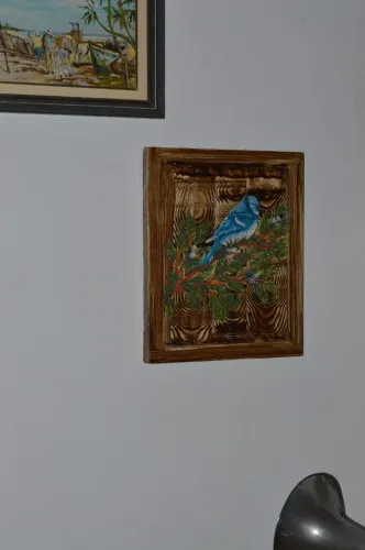 Quadro em madeira de pássaro