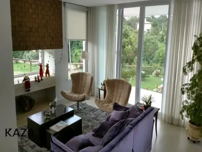 Comprar sobrado no condomínio Resedas Itupeva 4 vagas 3 suites, 4 salas. No piso térreo: S