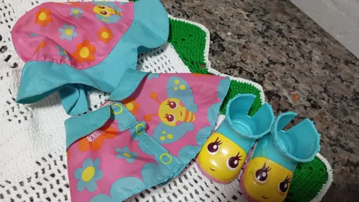 Capinha de chuva da Baby Alive