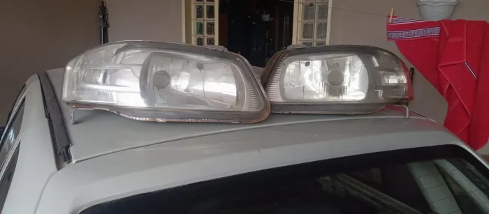 Par de Farol e lanternas originais gol G4