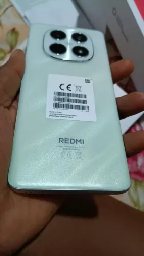 Celular na caixa redimi note 15 