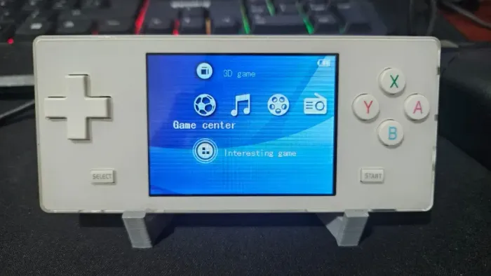 Dingoo A320 branco Dynacom - Video Game/Console portátil horizontal.