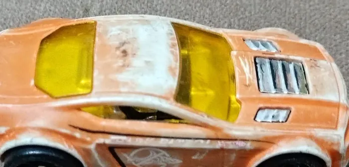 Carrinho Hotwheels torque twister laranja 2009