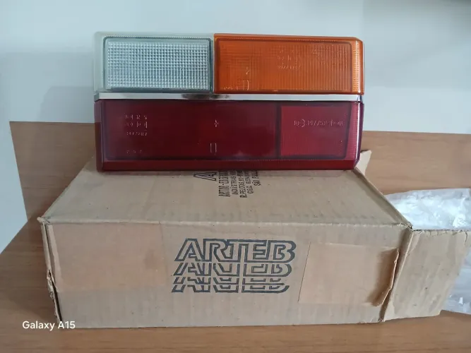 Lanterna traseira gol 80A86 bx gt arteb com logo vw
