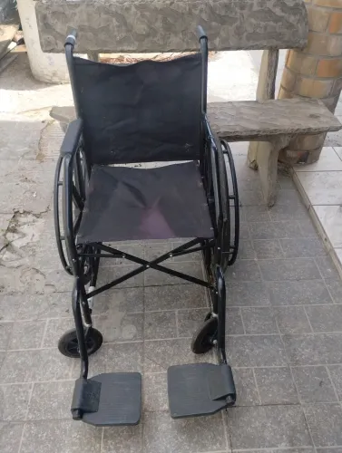 Cadeira de rodas .