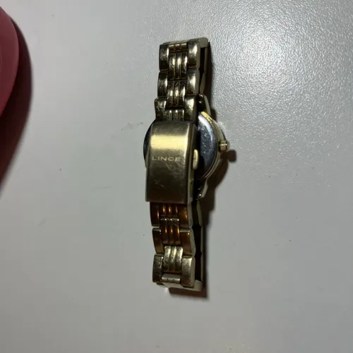 Relógio analógico pequeno dourado Lince
