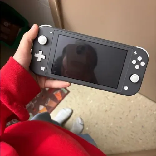 Nintendo switch lite 32gb COM JOGOS zerado faço envio