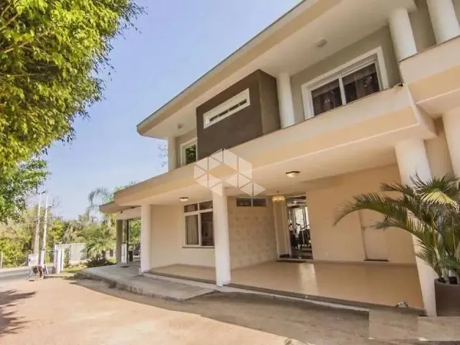 Casa Residencial 03 dormitórios no Bairro Pedra Redonda, condomínio Le Grand Village