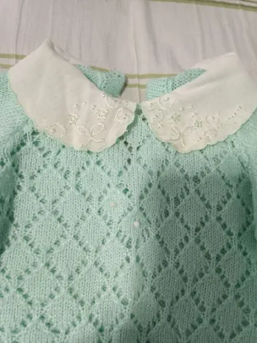 Conjunto de bebê em tricô verde claro
