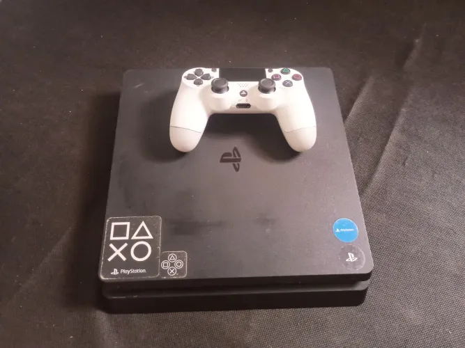 Vendo PS4 SLIM 1 controle usado 1.000,00