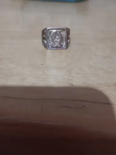 Dedeira de prata do coringa 