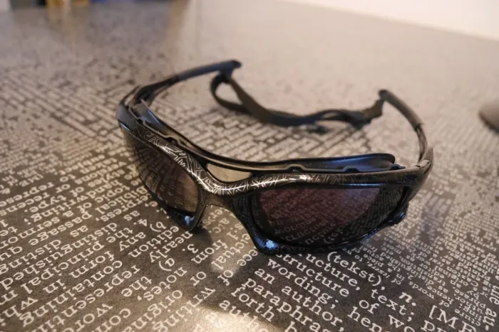 Oakley Wind jacket silver ghost text