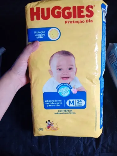 Fralda descartável huggies proteção dia, M  de 5 a 9,5kg