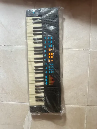 Teclado infantil usado