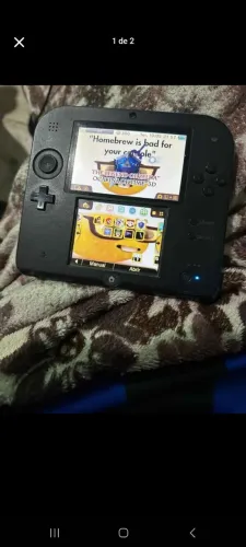 Nintendo 2ds desbloqueado<br>128gb com jogos instalados<br>Acompanha a caneta e carregador 