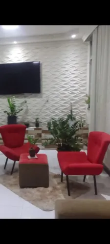 Poltrona, puff e tapete