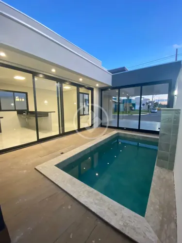 CASA EM CONDOMINIO FECHADO NO PRIMOR DAS TORRES COM 3 SUÍTES PISCINA COM CASCATA COZINHA G