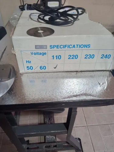 Máquina de cortar tecido