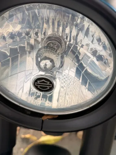 Farol, Guidom, escapamento e bateria Fat Boy Harley