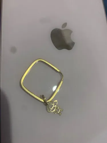 Lado de brinco Ouro 750 mais pigente filho unico