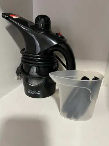 Ferro a vapor sugar
