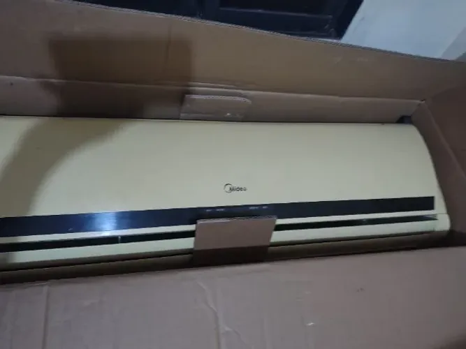 Vendo um ar condicionado e uma bicicleta .
