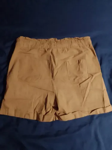 Macacão, shorts e shorts saia Tam M..cada 5,00