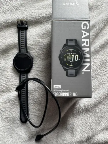 Relógio triatlón Garmin 165 novo