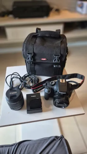 Canon Rebel T100 + 2 Lentes