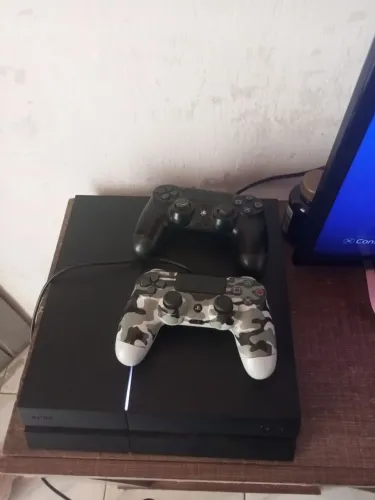 PS4 com 2 controle original +10 jogos