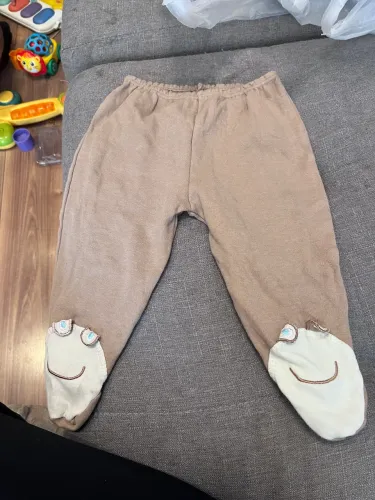 Calça com pezinho 12m