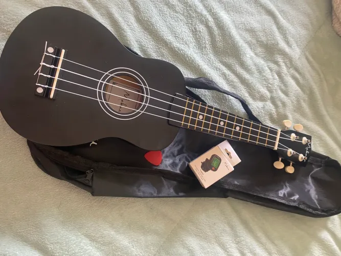 Ukulele- instrumento musical de corda