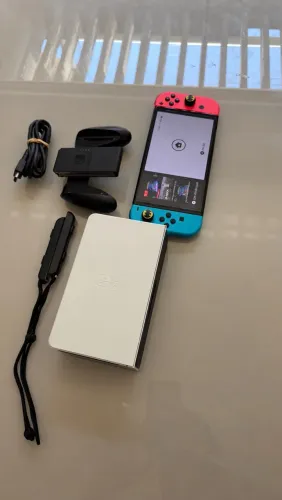Nitendo Switch Oled 64gb + cartão de memória 128gb