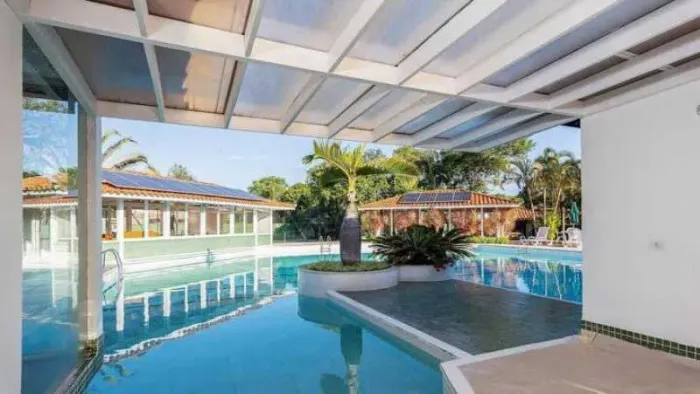 Casa em condomínio em Manguinhos 4 quartos, suítes Garagem privativa para 2 veículos