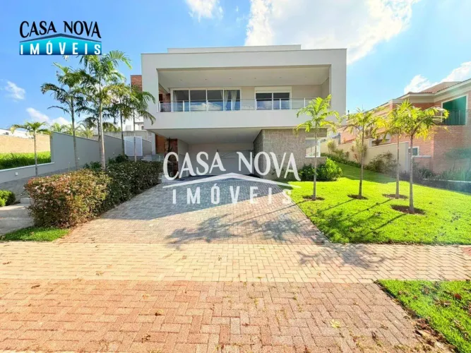 Casa com 5 suítes, 392 m² - venda por R$ 5.300.000 ou aluguel por R$ 25.000/mês - Condomín