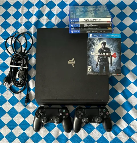 PS4 Pro 4K 1000Gb + 2 Controles + Cabos + 4 jogos