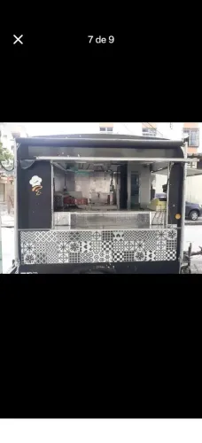 Vendo um trailer com uma chapa cadeira mesa fritadeira