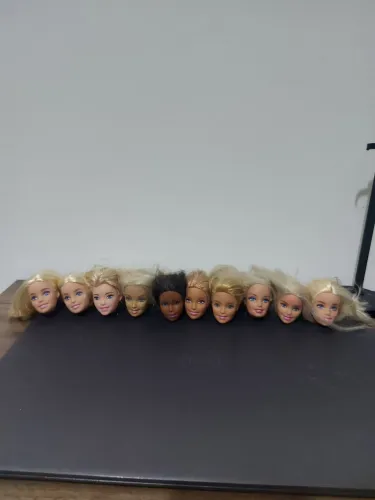 10 cabeças de barbie