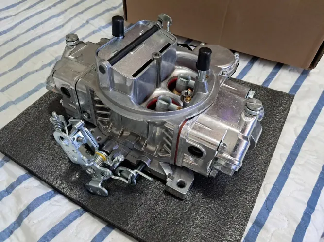 Carburador quadrijet 600 CFM Secundário a vácuo e afogador elétrico (Maverick v8 e outros)