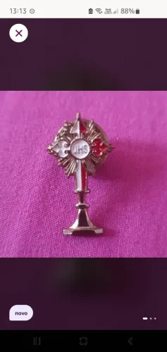 Broche religioso ostensorio