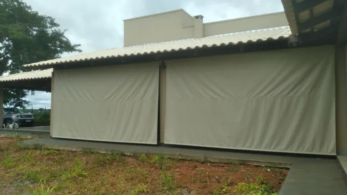 Toldos cortina com tela solar